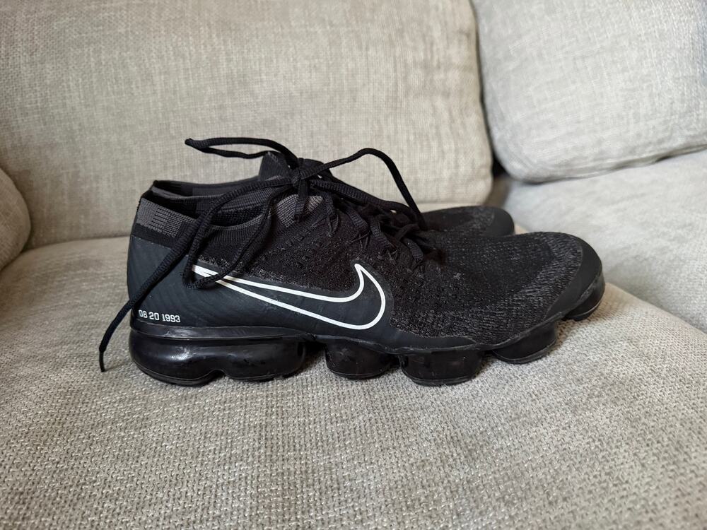 Nike Air VaporMax sneaker featuring a textured Flyknit upper black men’s size 11